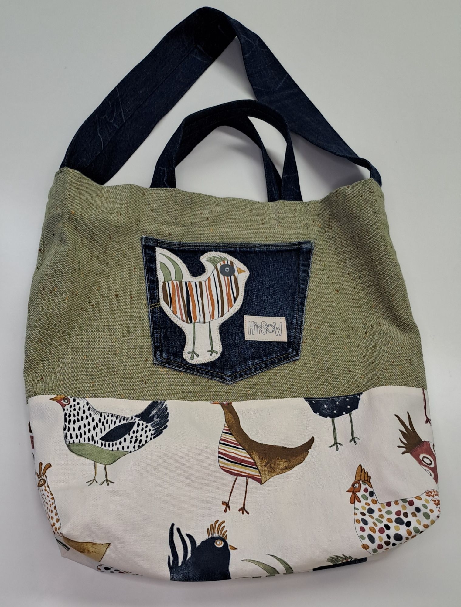 bunte Tragetasche mit Jeans, grün, bunte Hühner